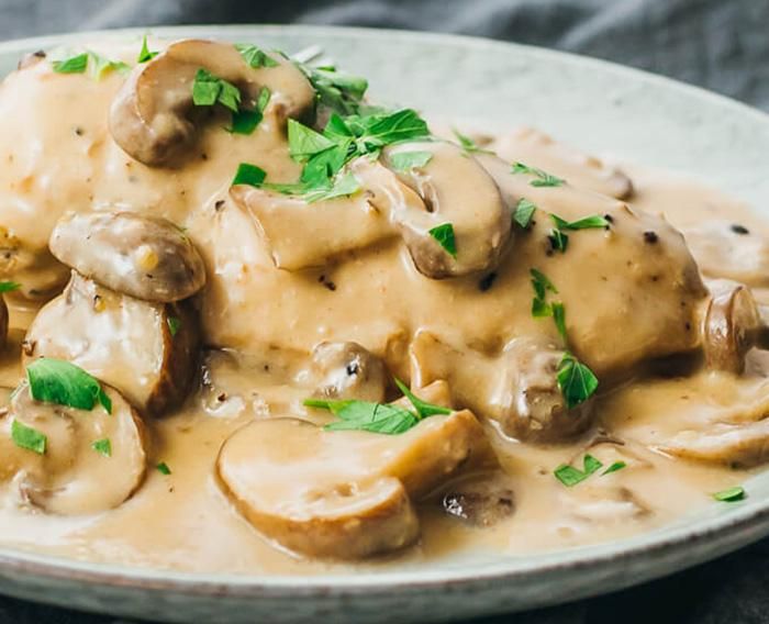 Cream Chicken Dish With Pottery