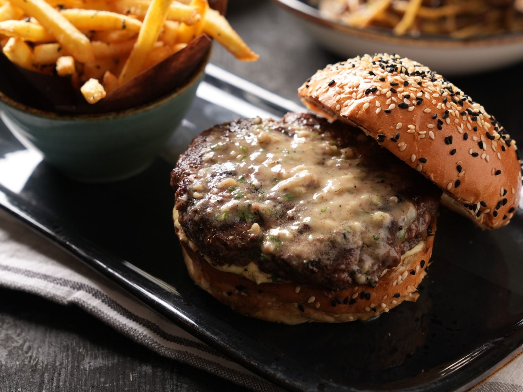 Ribeye Burger With Bone Marrow Butter And French Fries